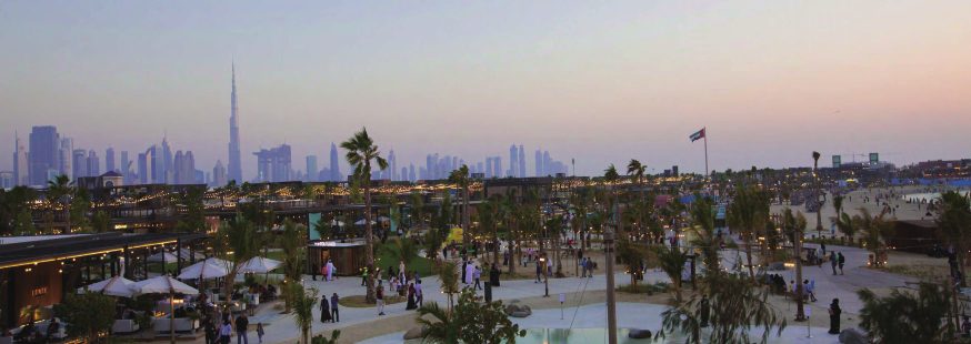LA MER beachfront at dusk in Dubai, U.A.E., with the city skyline